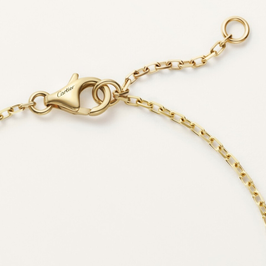 love-armband an einer kette mit strasssteinen besetzt