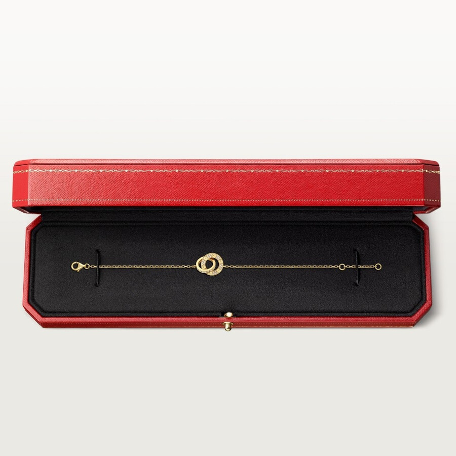 love-armband an einer kette mit strasssteinen besetzt